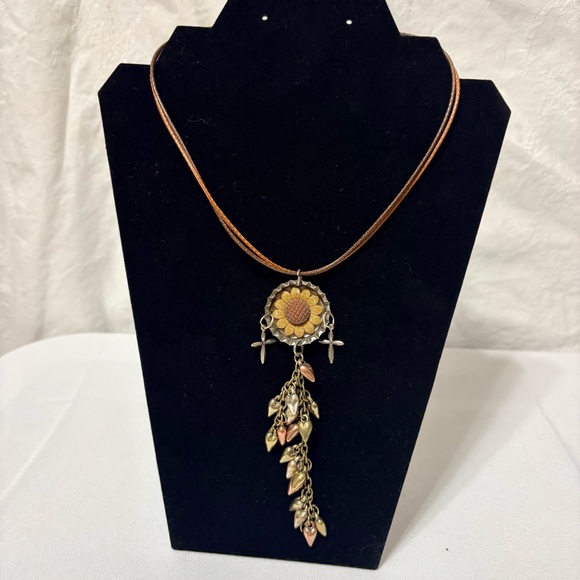 Jewelry - Handmade metal and leather sunflower necklace with multiple dangling charms